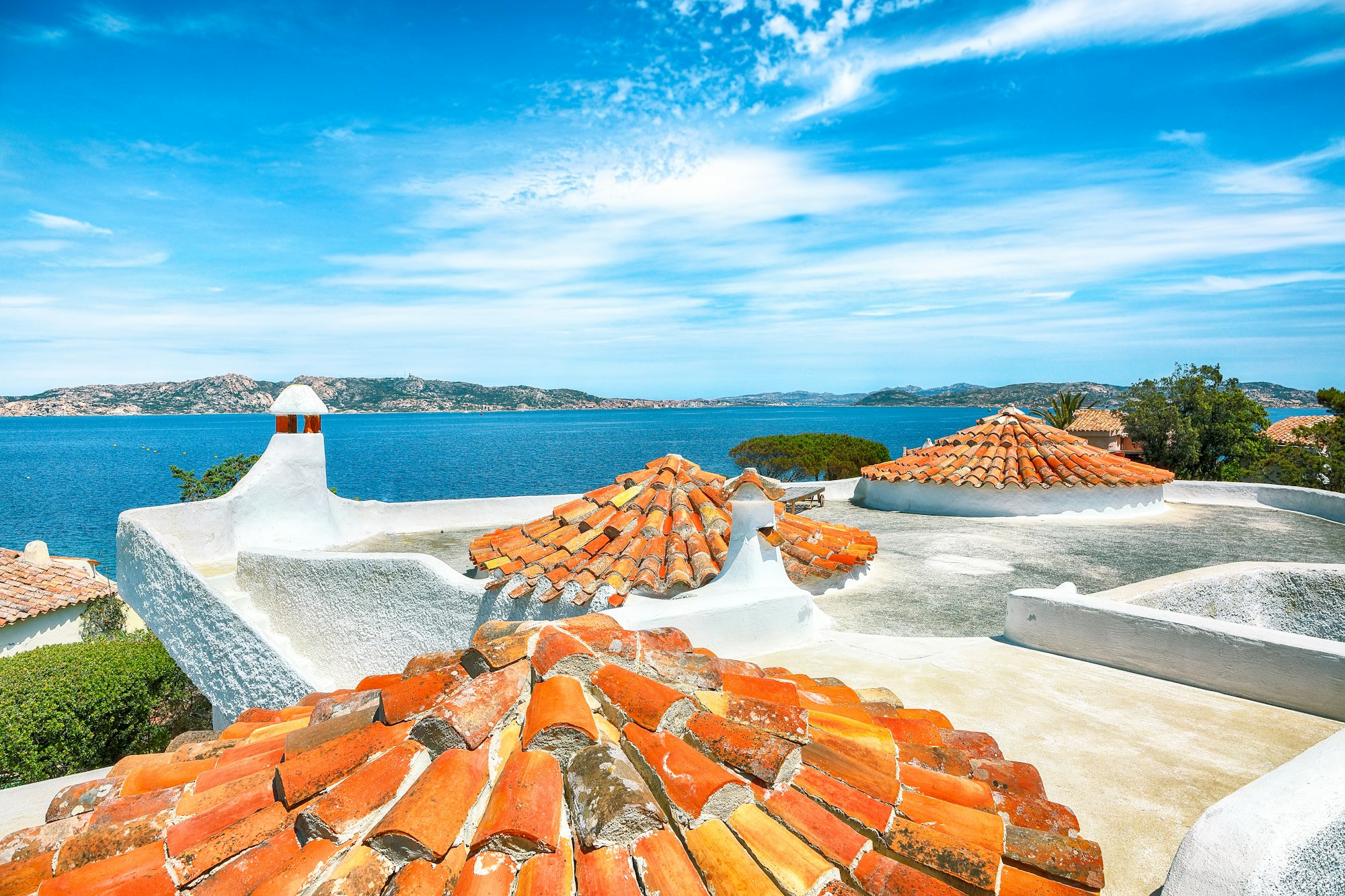 Captivating view of Porto Rafael resort. Awesome tiled roof of traditional houses